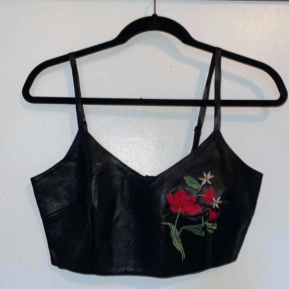 Fake leather crop top with flower embroidery from Wet Seal, size S